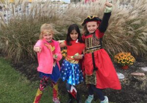 Girl Scouts celebrating Trunk or Treat